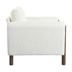 Poltrona decorativa imbottita in velluto Teddy con gambe in noce