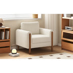 Poltrona decorativa imbottita in velluto Teddy con gambe in noce